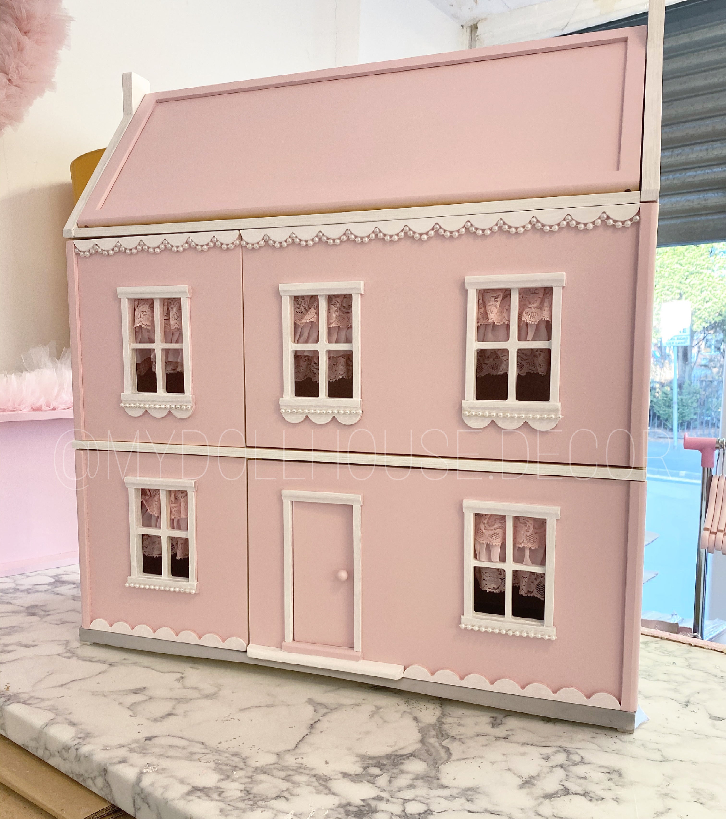 Pink and white sales dolls house